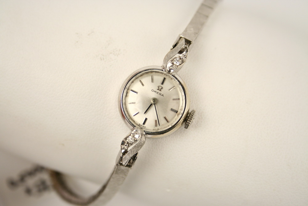 LADY'S WHITE GOLD OMEGA WATCH -