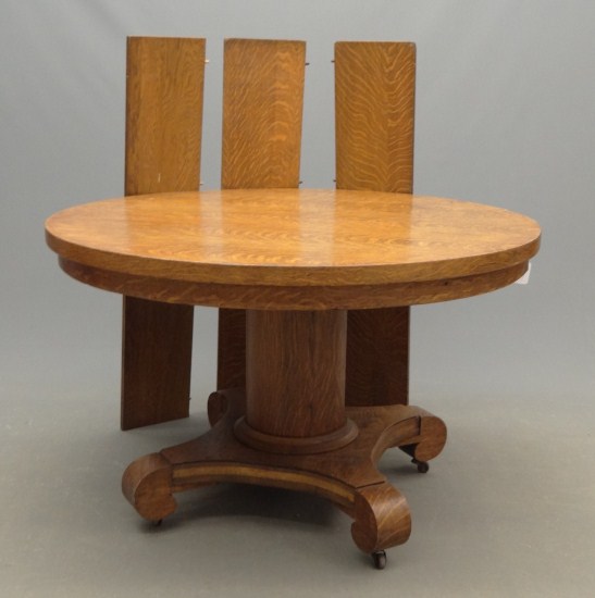Victorian round oak dining table.