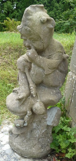 A reconstituted stone figure of