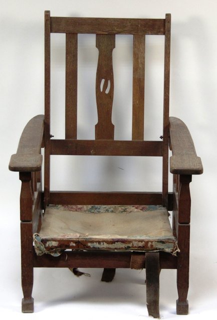 An Art Deco pearwood armchair in