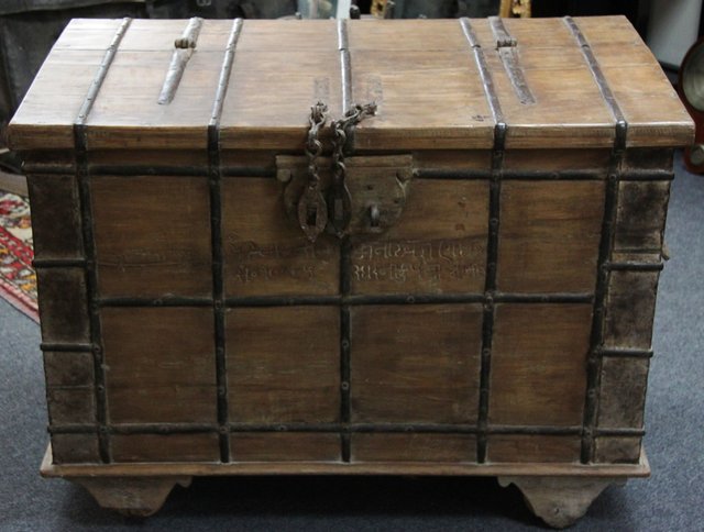 An Indian camphorwood chest metal strap