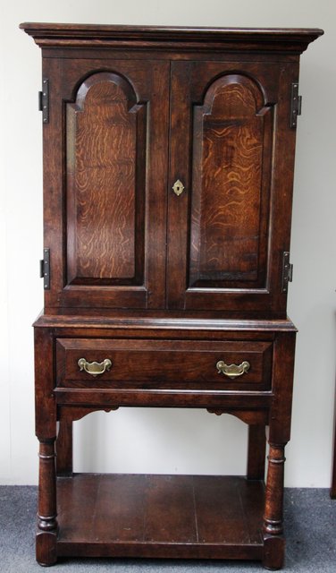 An 18th Century style oak cabinet