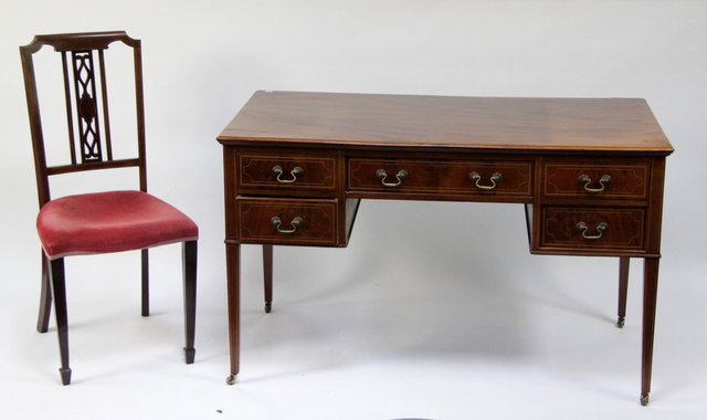 An Edwardian mahogany desk fitted 165b05