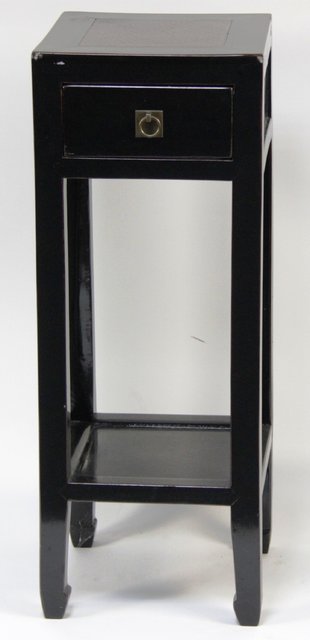 A Chinese ebonised bedside cupboard