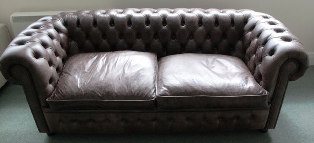 A leather button upholstered Chesterfield 165b20