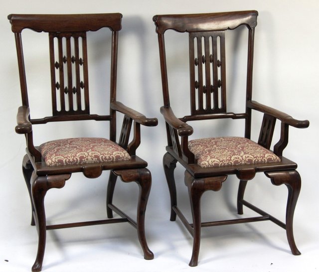 A pair of Chinese hardwood armchairs 165b23