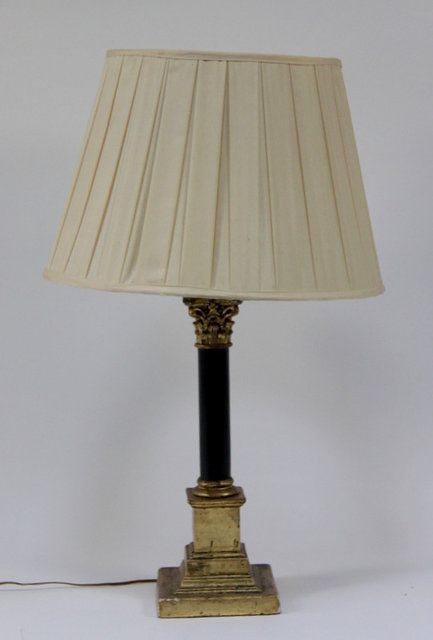 A table light with ebonised pillar and