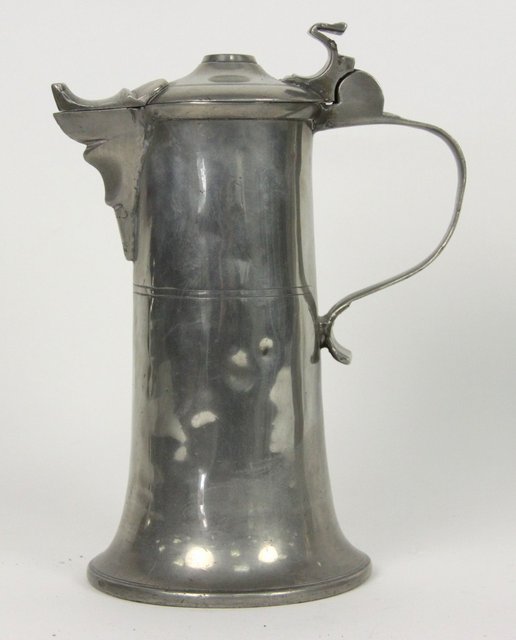 A Swiss pewter lidded flagon the domed