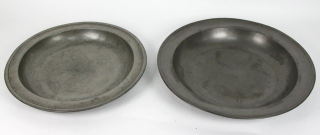 Two pewter single reeded platters