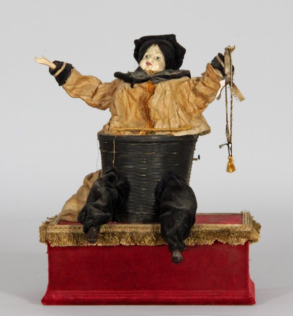 An automaton of a child with a hoop