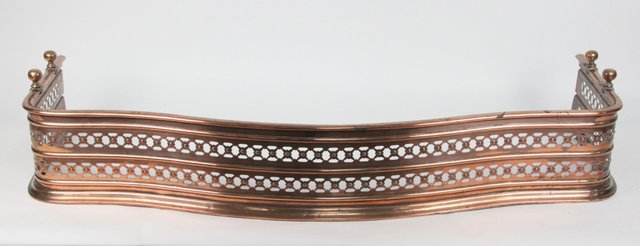 A copper serpentine fire curb circa