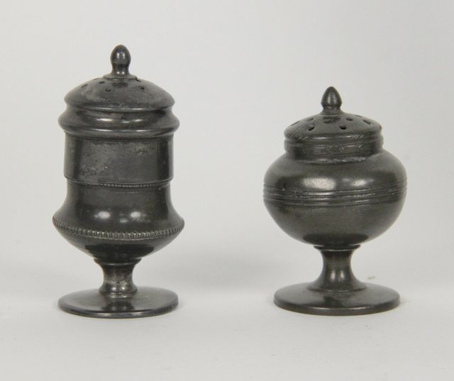 A picnic set of two pewter casters