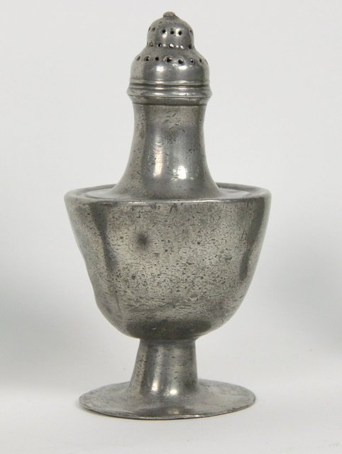 An unusual urn shaped pewter caster