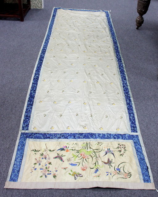 A Chinese embroidered silk panel one