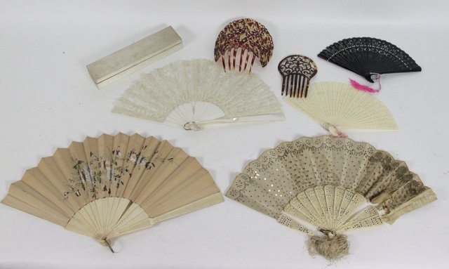 A quantity of fans and two faux