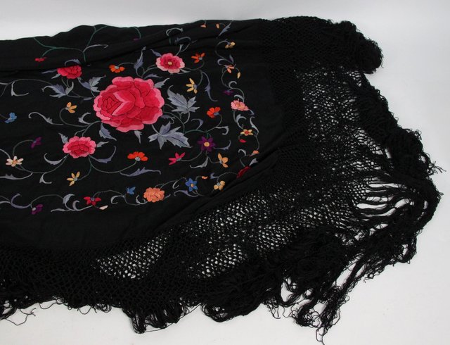 A Spanish black silk shawl embroidered
