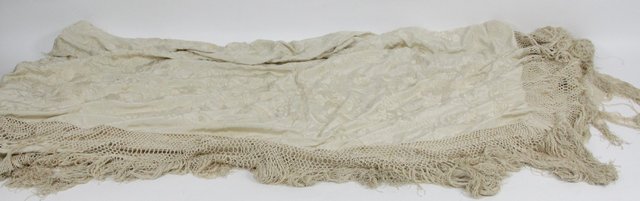 A cream silk shawl embroidered self-coloured