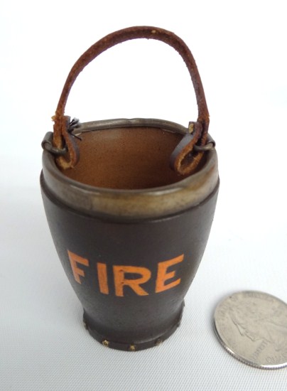 Miniature fire bucket signed on