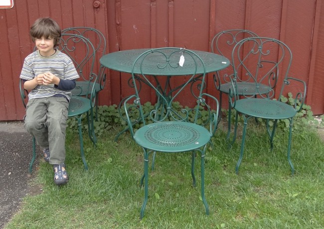 Patio set in green paint includes table
