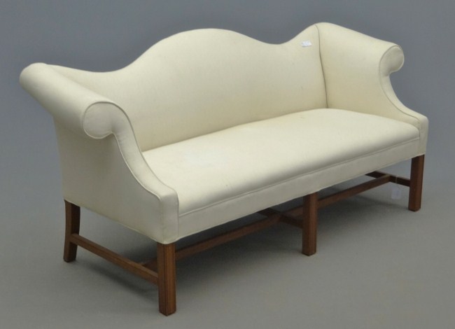 Chippendale style camelback sofa.