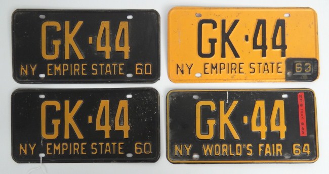 Lot four New York license plates including
