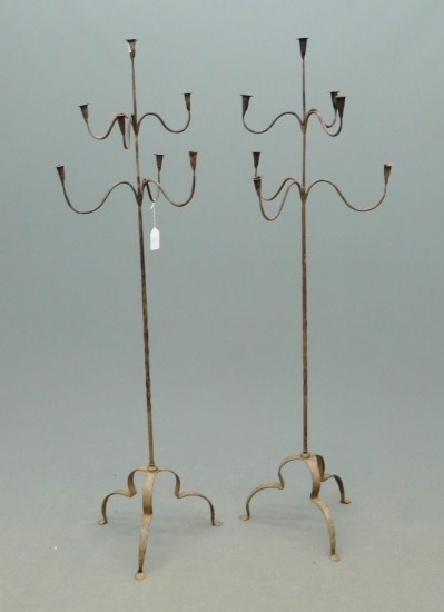 Pair iron floor torchieres. 61