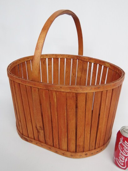 C. 1950 s wooden carrier/basket in