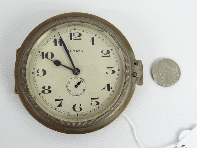 Swiss eight day auto clock. 4''