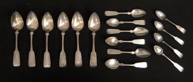379 grams coin silver spoons.