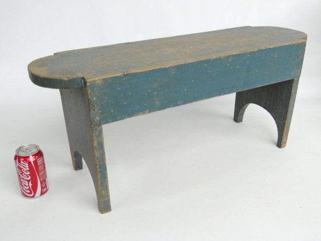 19th c. bench in blue bench ends are