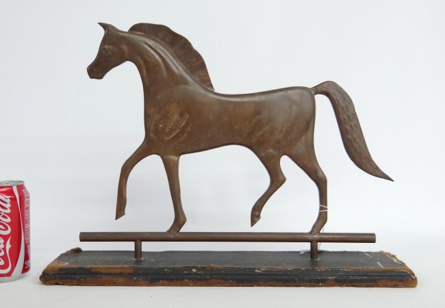 Copper horse weathervane mounted