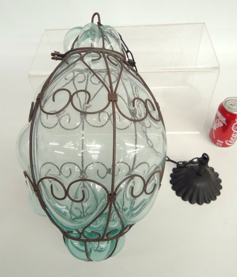 Hanging wire and bubble glass lamp.