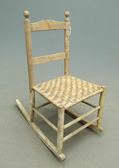 19th c. rocking chair with splint seat.