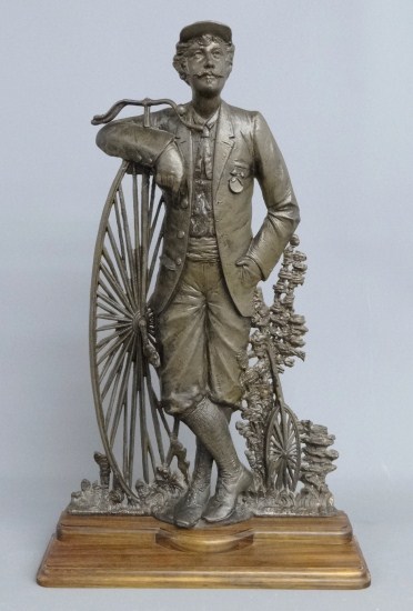 19th c. Cast iron statue of a wheelman