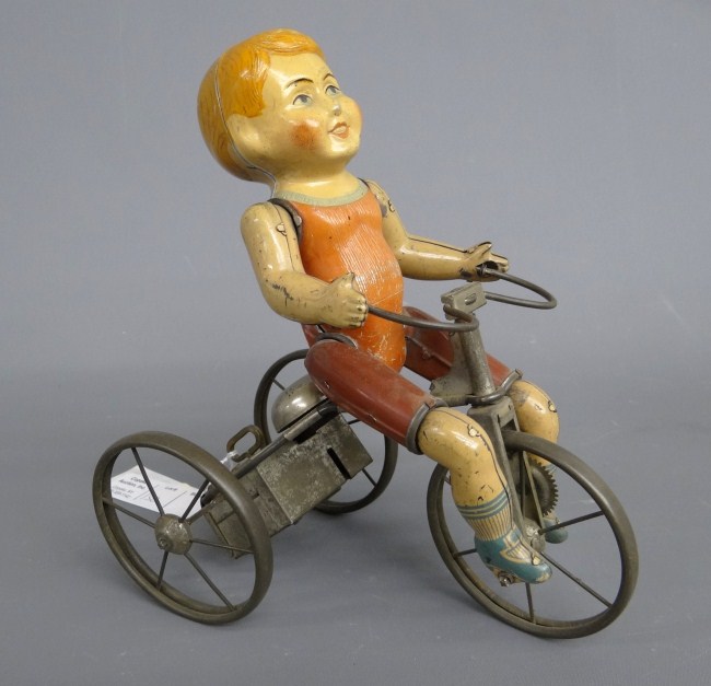 Vintage Kiddy Cyclist toy. 9 1/2''