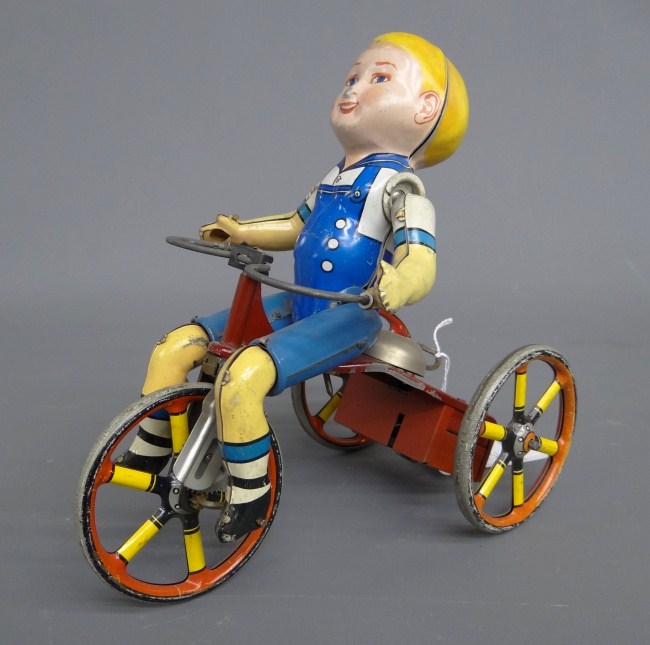 Vintage Kiddy Cyclist toy. 8 1/2''