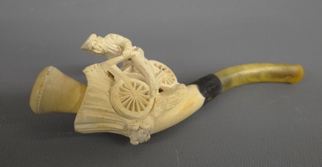 Meerschaum pipe depicts safety rider.