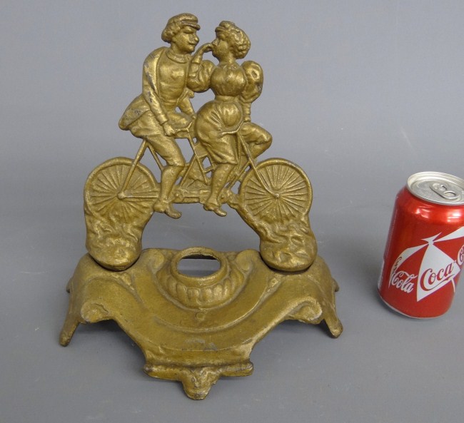 Early cast inkwell with couple