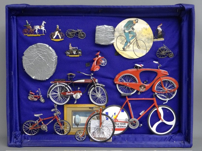 Museum display frame with new bicycle
