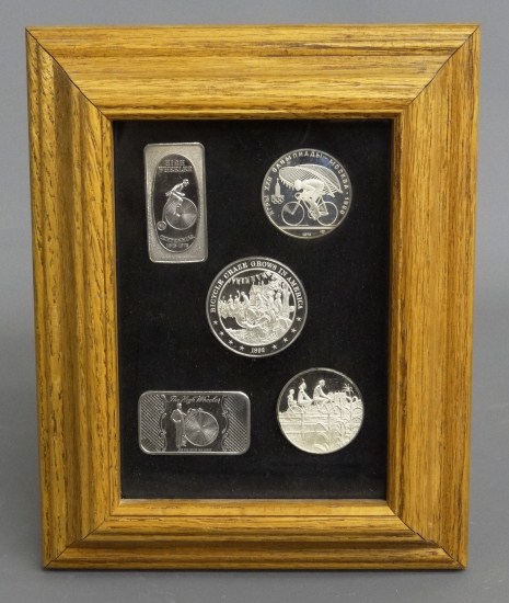 Sterling Silver tokens in frame.