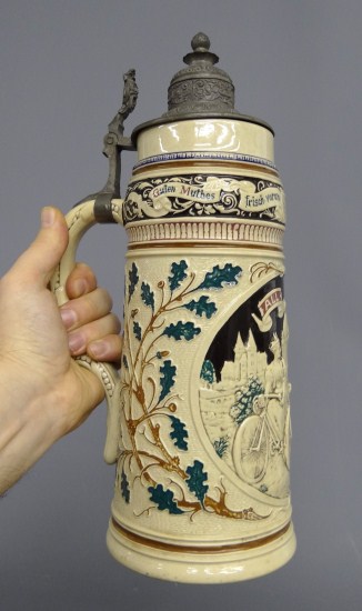 German stein with male and female