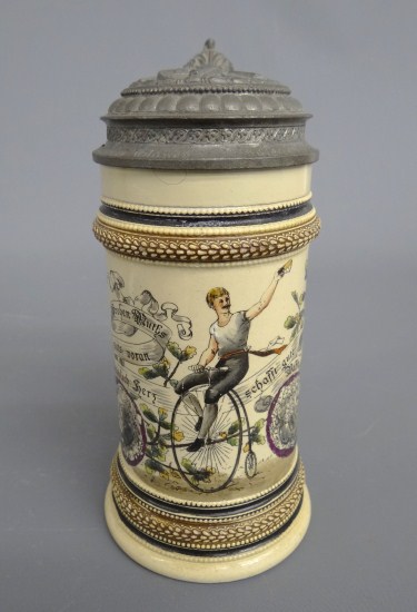 German stein with painted man on