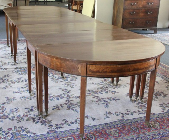 A mahogany dining table the whole with