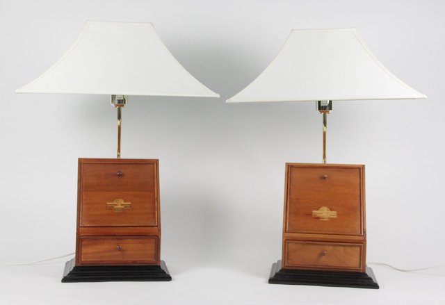 A pair of modern bedside lamps