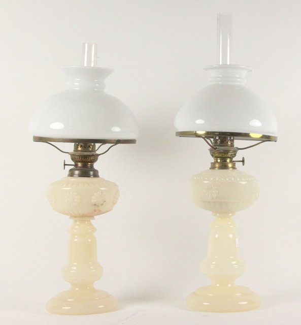 A pair of opaque glass oil lamps 164751