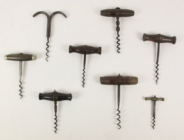 Six corkscrews with turned handles and
