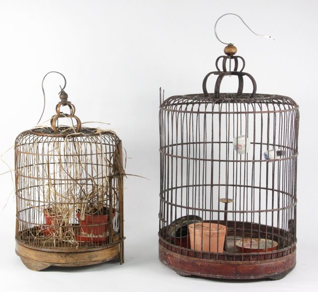 A wicker bird cage 69cm (27") high