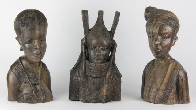 Three Nigerian carved hardwood 16477c