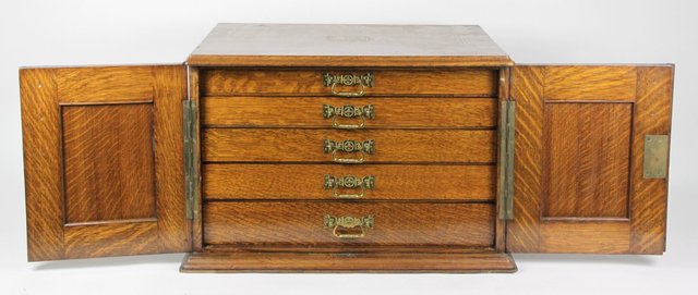 An Edwardian oak specimen cabinet 164787