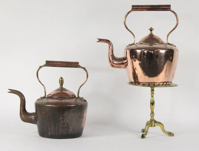 Two copper kettles and a brass kettle